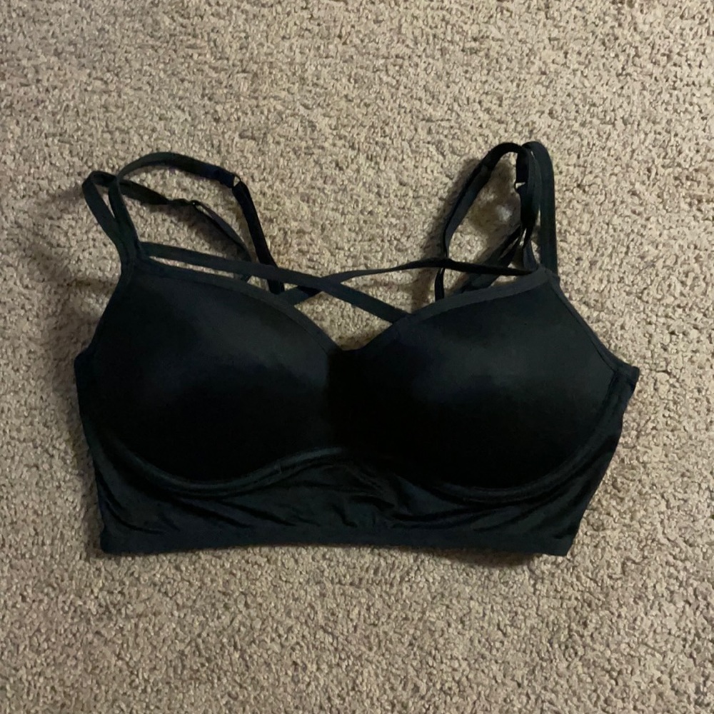 Pink strapped bra, cross ties in front